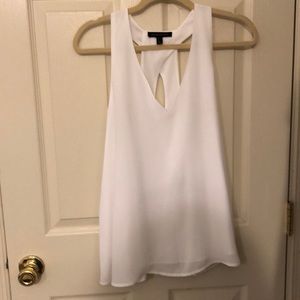 White sleeveless top
